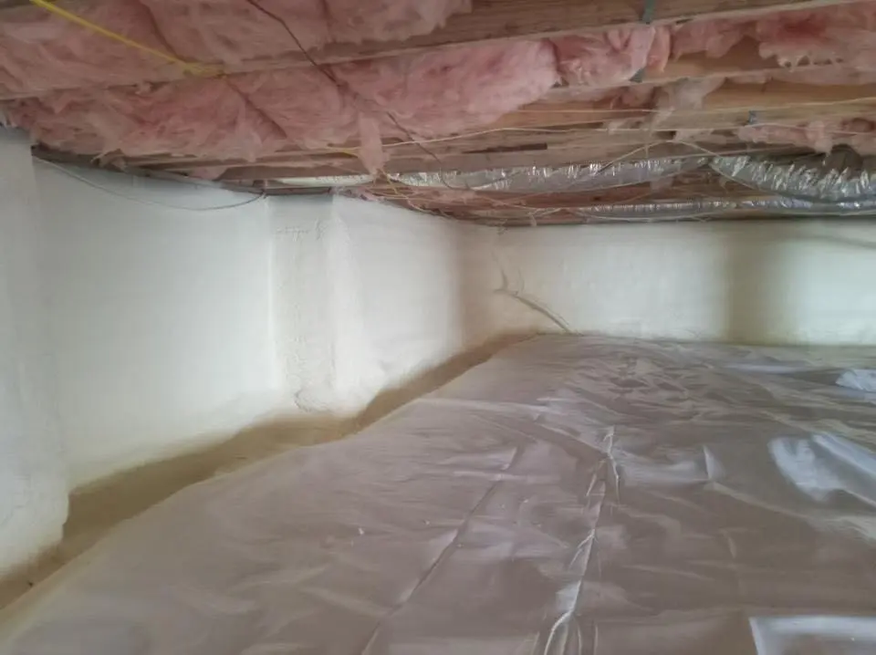 Crawl space encapsulation with closed-cell spray foam for Commercial Roof Restoration in Canton